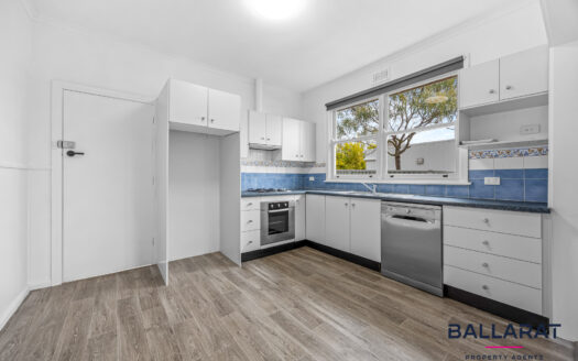 Freshly Painted Three Bedroom Home in Convenient Location!